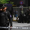 Cảnh sát đứng bên ngoài Đại sứ quán Israel tại Argentina sau khi có thông tin đe dọa đánh bom. (Nguồn: Getty Images)