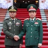 Bộ trưởng Quốc phòng Phan Văn Giang và Phó Thủ tướng, Bộ trưởng Bộ Quốc phòng Campuchia Tea Seihatại Lễ đón. (Ảnh: An Đăng/TTXVN)