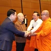 Tổng Bí thư Nguyễn Phú Trọng với các đại biểu dự kỳ họp. (Ảnh: Trí Dũng/TTXVN)
