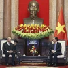 Chủ tịch nước Võ Văn Thưởng tiếp Phó Thủ tướng Lào Kikeo Khaykhamphithoune. (Ảnh: Thống Nhất/TTXVN)
