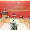 Thủ tướng Phạm Minh Chính chủ trì Hội nghị đánh giá tình hình 2 năm triển khai thực hiện Đề án 06. (Ảnh: Dương Giang/TTXVN)