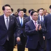 Thủ tướng Phạm Minh Chính và Tổng thống Yoon Suk Yeol tham dự Diễn đàn Doanh nghiệp Việt Nam-Hàn Quốc tháng 6/2023. (Ảnh: Dương Giang/TTXVN)