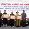 Lễ trao tặng danh hiệu vinh dự Nhà nước Nghệ nhân Nhân dân, Nghệ nhân Ưu tú trong lĩnh vực Di sản Văn hóa Phi vật thể. (Nguồn: TTXVN)