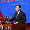 Chủ tịch Quốc hội Vương Đình Huệ trả lời ý kiến cử tri. (Ảnh: Nhan Sáng/TTXVN)