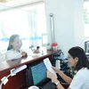 Doanh nghiệp đến thực hiện giao dịch tại Cục Thuế Tây Ninh. (Ảnh minh họa: Minh Phú/TTXVN)