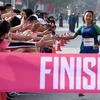 Vận động viên nữ mang số áo F25014 về Nhất nữ ở nội dung 42km. (Ảnh: Trung Kiên/TTXVN)