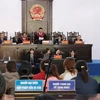 Hội đồng Xét xử khai mạc phiên tòa. (Ảnh: Nguyễn Dũng/TTXVN)