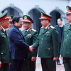 Thủ tướng Phạm Minh Chính đến thăm, chúc Tết cán bộ Tổng cục 2-Bộ Quốc phòng. (Ảnh: Dương Giang/TTXVN)