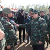 Thủ tướng Phạm Minh Chính chỉ đạo diễn tập, kiểm tra khả năng sẵn sàng chiến đấu, làm chủ vũ khí trang bị kỹ thuật mới hiện đại của Quân đoàn 12. (Ảnh: Dương Giang/TTXVN)
