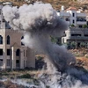 Khói bốc lên sau vụ tấn công bằng rocket trong cuộc đột kích của quân đội Israel tại Jenin, Khu Bờ Tây ngày 19/6/2023. (Ảnh: AFP/TTXVN)