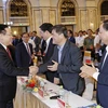 Chủ tịch Quốc hội Vương Đình Huệ với các đại biểu dự lễ công bố. (Ảnh: Nhan Sáng/TTXVN)