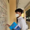 Thí sinh chuẩn bị vào phòng thi tại Trường Đại học Khoa học Tự nhiên, Đại học Quốc gia Thành phố Hồ Chí Minh. (Ảnh: Thu Hoài/TTXVN)