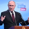 Tổng thống Nga Vladimir Putin trong cuộc họp báo tại Moskva sau khi kết quả bầu cử được công bố. (Ảnh: AFP/TTXVN)