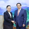 Thủ tướng Phạm Minh Chính tiếp bà Khamphao Eunthavanh, Đại sứ Lào tại Việt Nam. (Ảnh: Dương Giang/TTXVN)