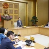 Phó Thủ tướng Trần Lưu Quang chủ trì cuộc họp. (Ảnh: Doãn Tấn/TTXVN)