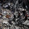 Cảnh đổ nát sau các cuộc không kích của Israel xuống Dải Gaza ngày 27/3. (Ảnh: THX/TTXVN)