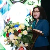 Bà Đoàn Thị Tuyết Nhung, Phó Tổng Giám đốc Thông tấn xã Việt Nam phát biểu. (Ảnh: Trương Văn Vị/TTXVN)
