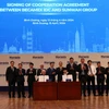 Lễ ký kết thỏa thuận hợp tác giữa Tổng Công ty Becamex IDC và Tập đoàn Sunwah (Trung Quốc). (Ảnh: Dương Chí Tưởng/TTXVN)