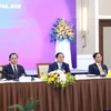 Thủ tướng Phạm Minh Chính, Thủ tướng Lào Sonexay Siphandone (thứ hai, từ trái sang) cùng Tổng Thư ký ASEAN Kao Kim Hourn (ngoài cùng, bên trái) tham dự Tọa đàm với doanh nghiệp ASEAN và đối tác. (Ảnh: Dương Giang/TTXVN)