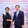 Bộ trưởng Ngoại giao Bùi Thanh Sơn với Bộ trưởng Ngoại giao Indonesia Retno Marsudi. (Ảnh: Phạm Kiên/TTXVN)