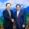 Thủ tướng Phạm Minh Chính tiếp ông Park Hark Kyu, Tổng Giám đốc phụ trách tài chính của Tập đoàn Samsung. (Ảnh: Dương Giang/TTXVN)