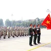 Cán bộ, sỹ quan, quân nhân Cục Gìn giữ Hòa bình Việt Nam tại Lễ báo công dâng Bác. (Ảnh: Trọng Đức/TTXVN)
