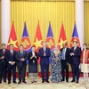 Chủ tịch nước Tô Lâm với Đại sứ các nước ASEAN. (Ảnh: Nhan Sáng/TTXVN)