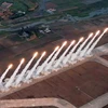 Cuộc tập trận sử dụng bệ phóng tên lửa đa nòng siêu lớn của quân đội Triều Tiên ngày 30/5. (Ảnh: Yonhap/TTXVN)