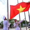 Lễ Thượng cờ các nước tham dự tại Đại hội Thể thao học sinh Đông Nam Á lần thứ 13. (Ảnh: Trần Lê Lâm/TTXVN)