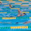 Vận động viên nữ các nước tranh tài nội dung bơi tự do tại vòng loại. (Ảnh: Trần Lê Lâm/TTXVN)