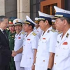Chủ tịch nước Tô Lâm với lãnh đạo Bộ Tư lệnh Quân chủng Hải quân. (Ảnh: Nhan Sáng/TTXVN)