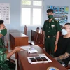 Đồn Biên phòng Phước Chỉ thuộc Bộ đội Biên phòng tỉnh Tây Ninh tiến hành lấy lời khai ban đầu đối với Tạ Nhạc Chương. (Ảnh: TTXVN phát)