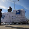 Hàng viện trợ nhân đạo được chuyển tới Khan Younis, Dải Gaza, ngày 31/5. (Ảnh: THX/TTXVN)