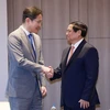 Thủ tướng Phạm Minh Chính tiếp Chủ tịch Tập đoàn Samsung Lee Jae Yong. (Ảnh: Dương Giang/TTXVN)