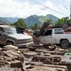 Các phương tiện bị phá hủy khi bão Beryl quét qua. (Nguồn: AFP/TTXVN)