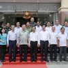 Chủ tịch nước Tô Lâm với cán bộ chủ chốt tỉnh An Giang. (Ảnh: Nhan Sáng/TTXVN)