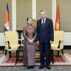 Chủ tịch nước Tô Lâm với Chủ tịch Hội Hữu nghị Campuchia-Việt Nam Men Sam An. (Ảnh: Nhan Sáng/TTXVN)