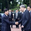 Chủ tịch nước Tô Lâm đón Tổng Bí thư, Chủ tịch nước Lào Thongloun Sisoulith. (Ảnh: Nhan Sáng/TTXVN)