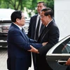 Thủ tướng Phạm Minh Chính tiếp Chủ tịch Đảng Nhân dân Campuchia Samdech Hun Sen. (Ảnh: Dương Giang/TTXVN)