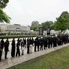 Đông đảo người dân chờ viếng Tổng Bí thư Nguyễn Phú Trọng tại Hội trường Thống Nhất, Thành phố Hồ Chí Minh. (Ảnh: Anh Tuấn/TTXVN)
