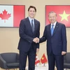 Tổng Bí thư, Chủ tịch nước Tô Lâm tiếp xúc song phương với Thủ tướng Canada Justin Trudeau. (Ảnh: Trí Dũng/TTXVN)