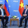 Thủ tướng Phạm Minh Chính gặp Tổng thống Venezuela Nicolas Maduro. (Ảnh: Dương Giang/TTXVN)