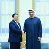 Thủ tướng Phạm Minh Chính hội đàm với Tổng thống Các Tiểu Vương quốc Arab Thống nhất (UAE) Mohamed bin Zayed Al Nahyan. (Ảnh: Dương Giang/TTXVN)