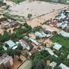 Hàng trăm hộ dân tại phường Phước Tân (thành phố Biên Hòa, tỉnh Đồng Nai) bị ngập sâu trong nước lũ. (Ảnh: Lê Xuân/TTXVN)