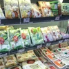Các sản phẩm chay như bánh bao, tàu hũ, nấm, bột đậu... xuất hiện nhiều tại các hệ thống siêu thị. (Ảnh: Việt Anh/Vietnam+)