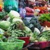 Ghi nhận tại các chợ truyền thống, rau xanh là mặt hàng tăng mạnh nhất do ảnh hưởng từ thời tiết rét đậm. (Ảnh: Việt Anh/Vietnam+)
