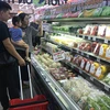Người tiêu dùng Thủ đô có thể mua các loại rau củ quả được áp dụng mức giá phải chăng tại các hệ thống siêu thị. (Ảnh: Việt Anh/Vietnam+)
