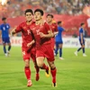 Tiền vệ Nguyễn Đình Bắc (số 15) ăn mừng sau khi mở tỷ số cho Đội tuyển U23 Việt Nam ở trận đấu với U23 Singapore. (Ảnh: PV/Vietnam+)