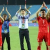 Huấn luyện viên Kim Sang-sik (giữa) mang đến những tín hiệu tích cực cho Đội tuyển Việt Nam. (Ảnh: Hoài Nam/Vietnam+)