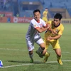 Đội khách Hải Phòng (áo trắng) cầm hòa Hà Nội FC với tỷ số 2-2 ở vòng 7 V-League 2024-2025. (Ảnh: Việt Anh/Vietnam+)